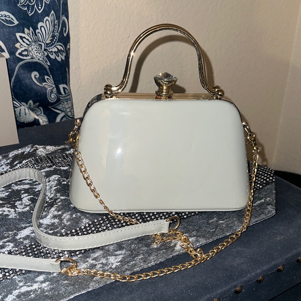 Elegant Gray Handbag with Gold Accents